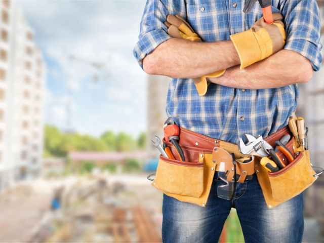 tradie with toolbelt shutterstock_1287829237