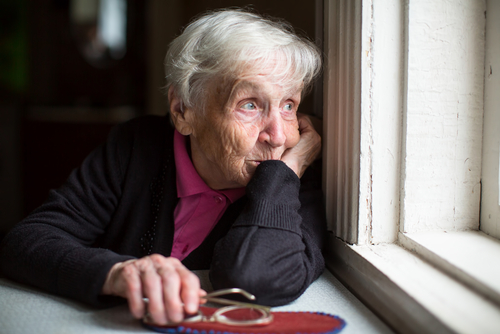lonely old lady by De Visu shutterstock_521175373